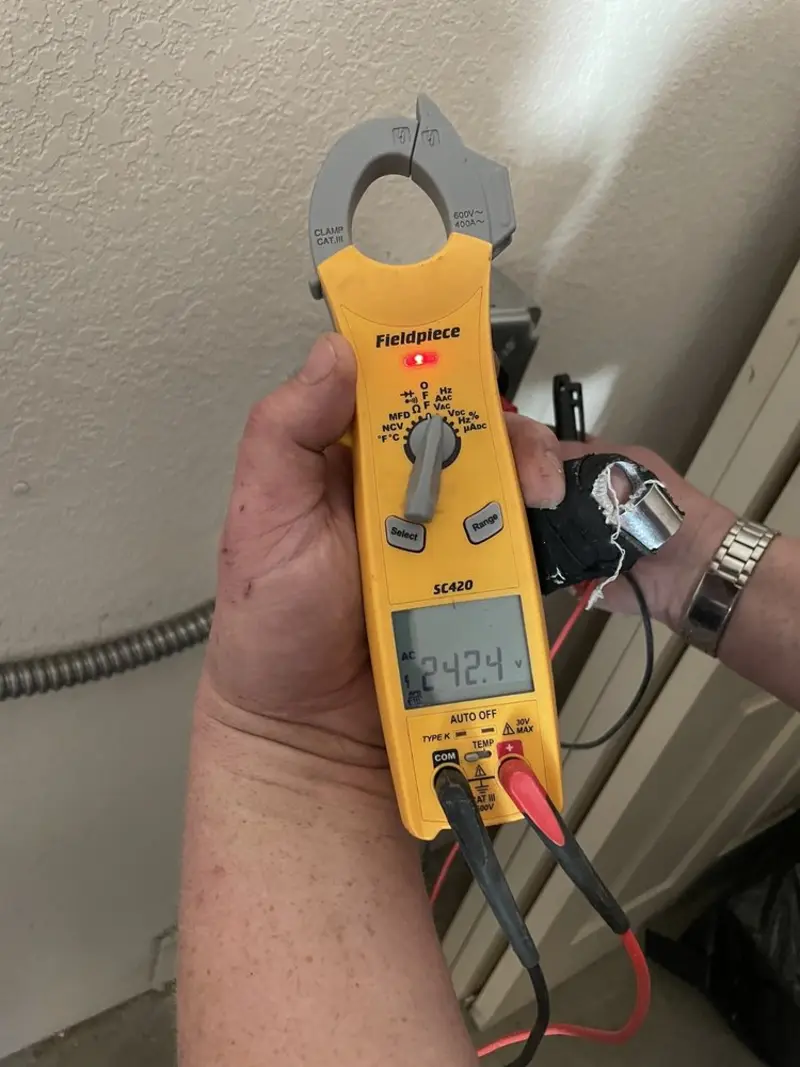 Voltage testing with clamp meter during Aluminum Wiring Replacement in Tewksbury